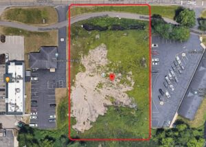rectangular outline of vacant land in aerial photo